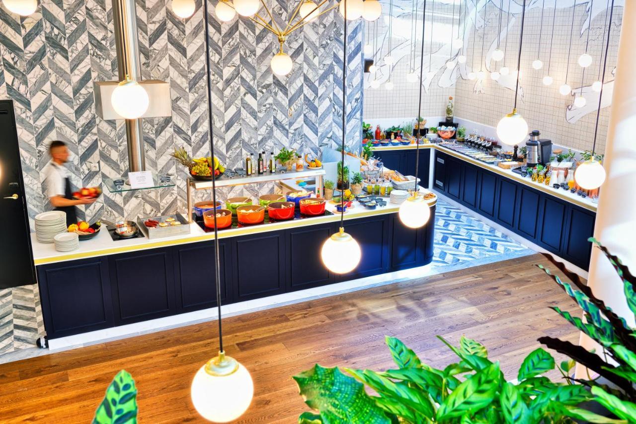 Hotel Ferreus Modern Art Deco Cracovia Exterior foto The kitchen at the restaurant