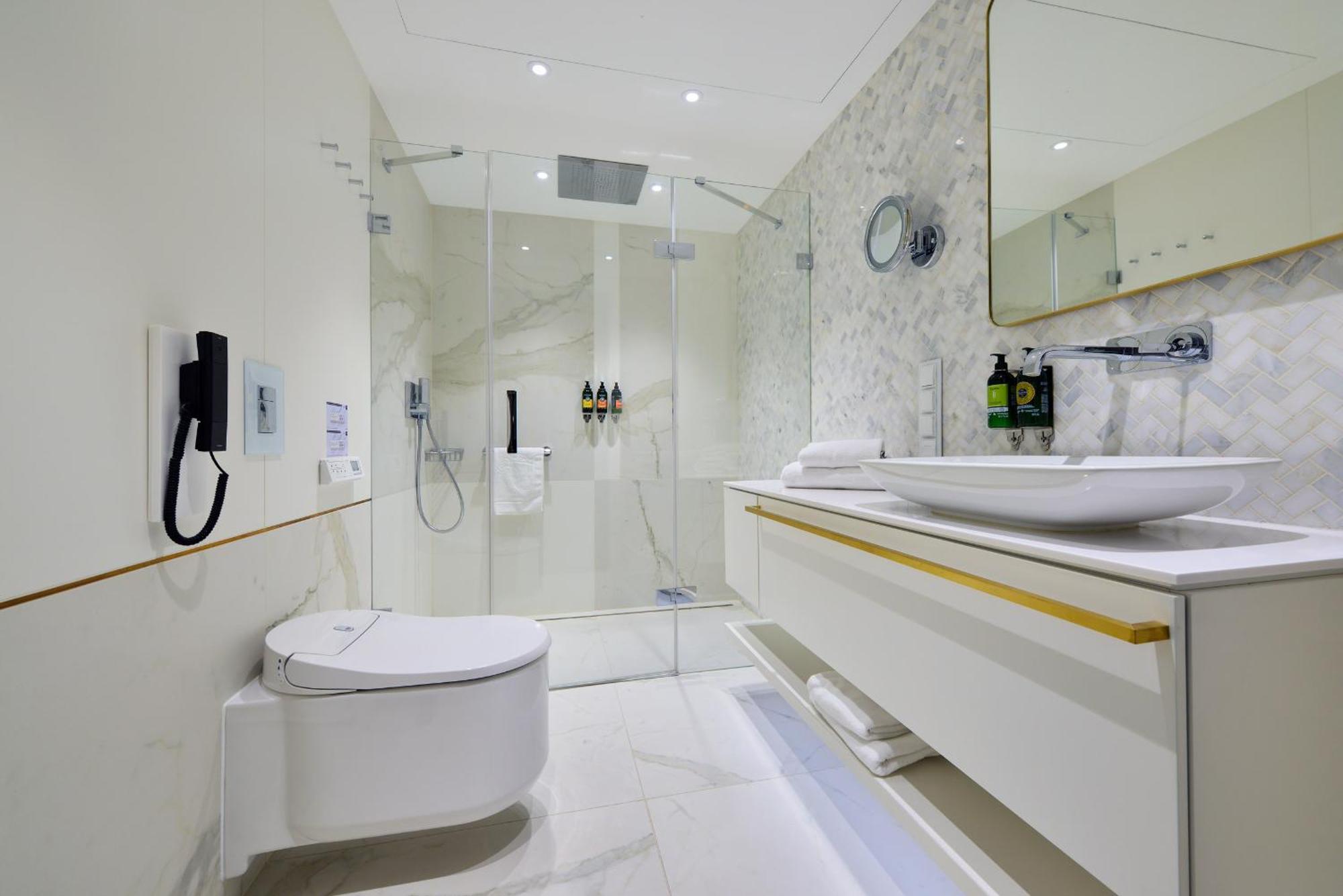 Hotel Ferreus Modern Art Deco Cracovia Exterior foto A modern bathroom